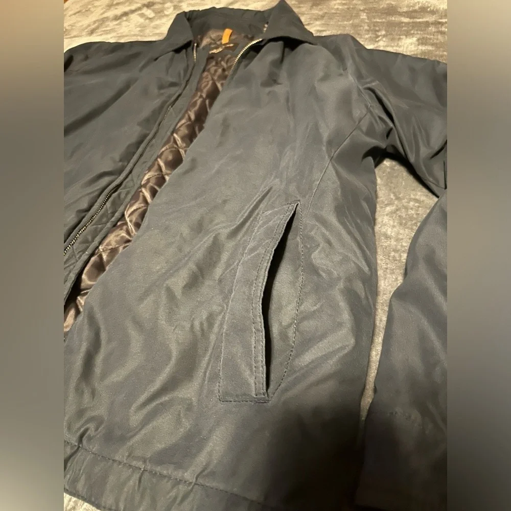 Men’s size small Dockers long sleeve jacket with pockets and neck collar